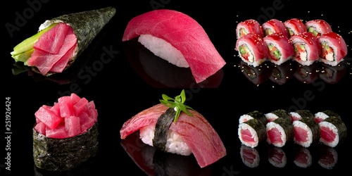 Set of different types of sushi with tuna: nigiri, gunkan, rolls and temaki on black background. Traditional Japanese cuisine