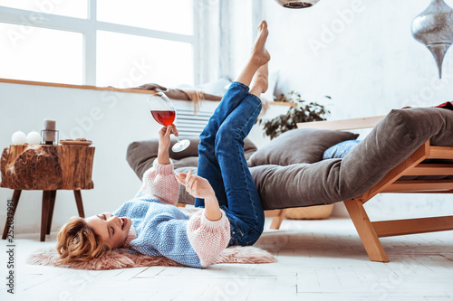 Joyful positive woman enjoying her time at home