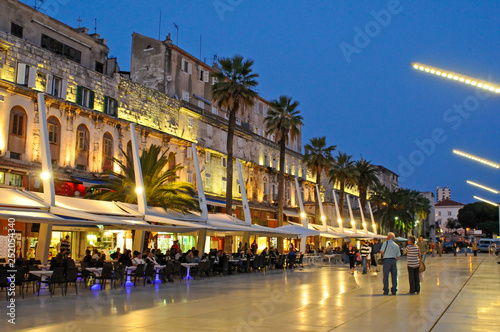 Riva waterfront along the walls of the Diocletian Palace at dusk, Split, Croatia