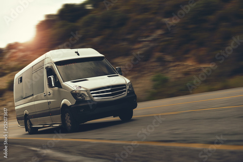 tourist minibus is drive by highway