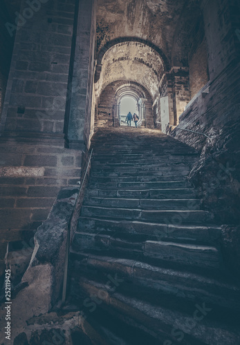 happy tourist visiting old abbey sacra san michele, turin, Italy