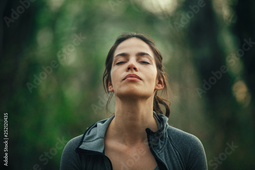 Young beautiful woman exercise in the forest