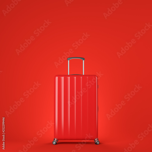 Red suitcase over red