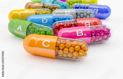 3d rendering of many vitamin capsule