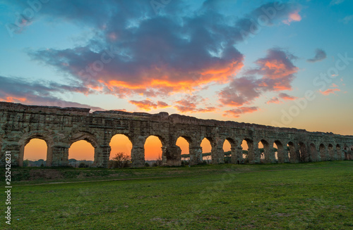 Rome (Italy) - The Parco degli Acquedotti at sunset, an archeological public park in Rome, part of the Appian Way Regional Park, with monumental ruins of roman aqueducts.