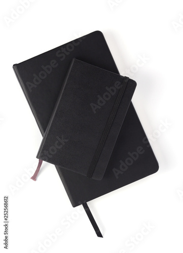 closed notebook or notepad at white background