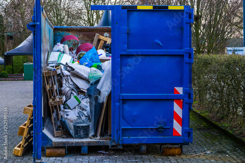 large bulky waste container, Full of garbage, recycling concept, environment awareness