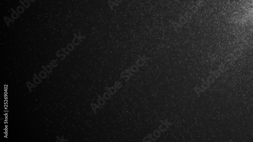 Natural organic dust particles floating on a black background. Glittering sparkling particles randomly rotate. White dynamic particles. Particles flickering in space 3d illustration