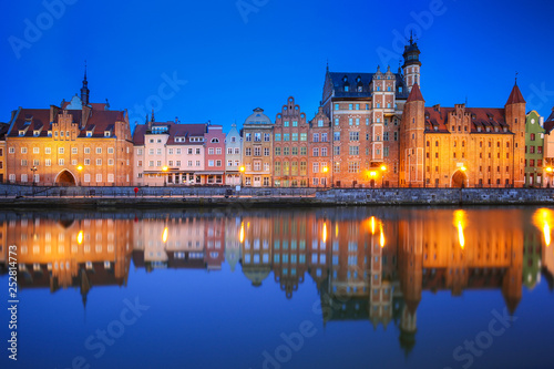 Beautiful old town of Gdansk reflected in Motlawa river at dawn, Poland