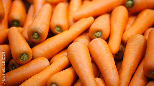 Beautiful ripe carrot background.Carrots in the supermarket.