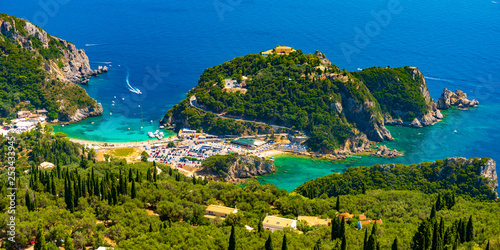 Panoramic view of Palaiokastritsa, boats and beach Corfu, Greece