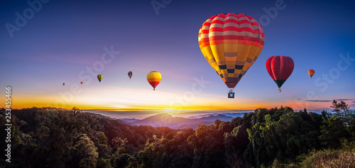 Colorful hot air balloons flying over mountain at Dot Inthanon in Chiang Mai, Thailand