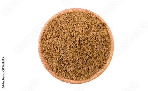 garam masala mix in wooden bowl isolated on white background. Spices and food ingredients.