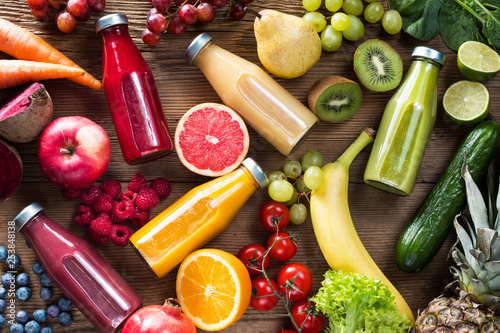 Colorful smoothies in bottles