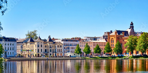 Old town of Schwerin with historic houses on Pfaffenteich lake. Mecklenburg-Vorpommern, Germany
