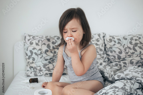  The girl got sick. The girl has snot and cough. The girl is in bed and sick