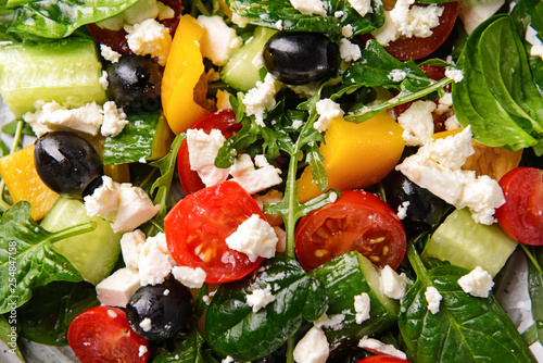 Healthy salad with feta cheese, closeup