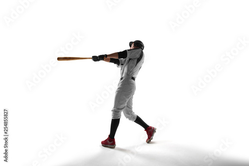 Baseball player isolated on white.