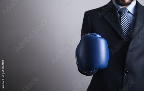 Businessman in boxing gloves. Business, Power, Sport