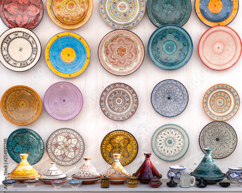 Traditional Moroccan market with souvenirs. Handmade ceramic plates
