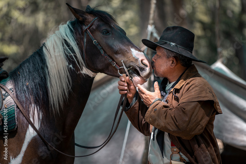 Cowboy kiss his best friend horse