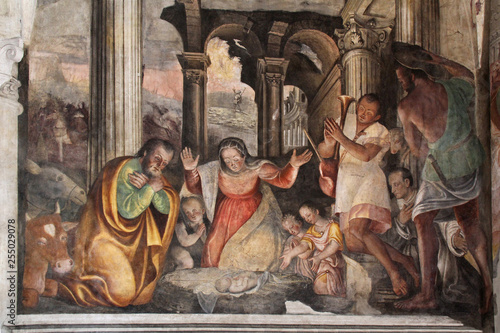 Natività; angioletti e simbolo eucaristico; affresco nella chiesa di "San Cristo" a Brescia