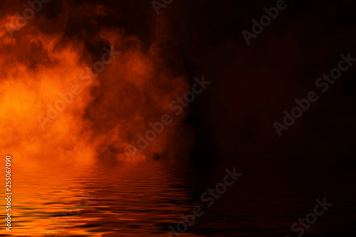 Fire smoke with reflection in water. Mistery fog texture background