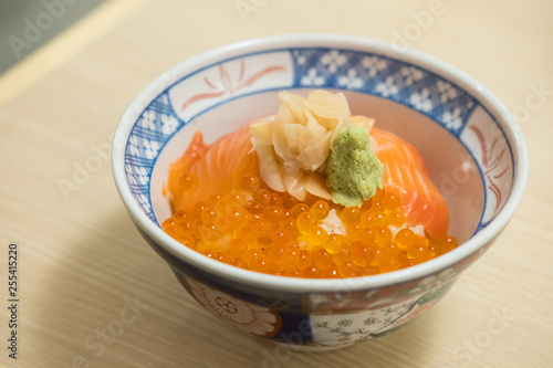 Salmon Sashimi rice bowl, served on the table