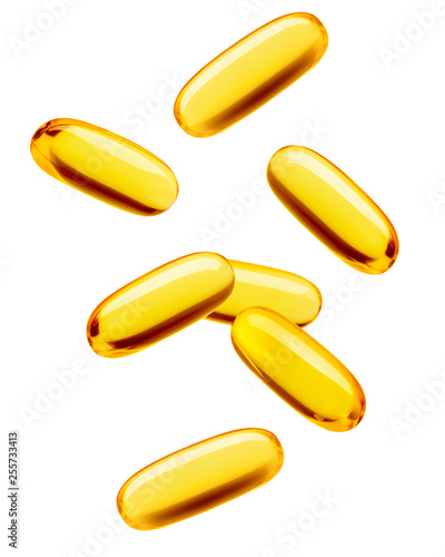 Falling Fish oil pill, omega 3, isolated on white background, clipping path, full depth of field