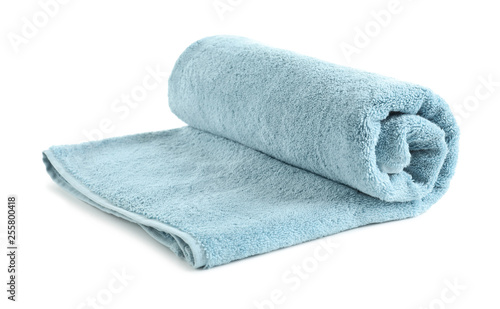 Rolled soft terry towel on white background