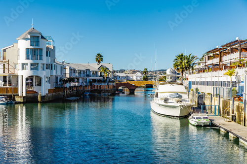 Knysna waterfront with houses and boats, part of Thesen island.