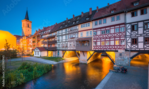 Historic city center of Erfurt with famous Krämerbrücke bridge illuminated at twilight, Thüringen, Germany