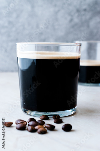 Frothy Cold Brew Nitro Coffee with Beans Ready to Drink.