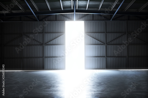 Empty building hangar with the door open with room for text or copy space. 3d rendering interior