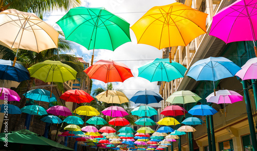 multicolored umbrellas in le caudan waterfront, port louis capital of mauritius