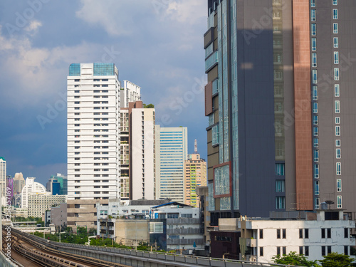 Modern city building with railway of train in Bangkok