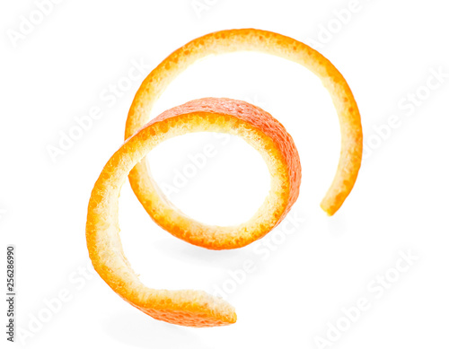 Orange zest spiral isolated on white background. Vitamin C.