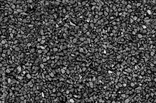 Black (gray) small crushed stones background texture