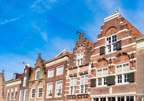 row gable houses in Dordrecht on square called Statenplein, The Netherlands