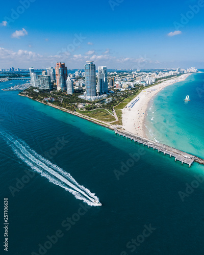Aerial view of Miami Beach with speedboat in view