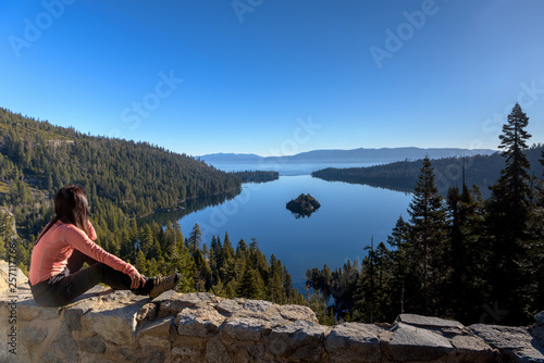 A woman traveller enjoying view of Emerald Bay in the morning, California, USA