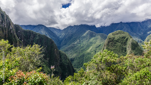 High mountains surrounded by green vegetation