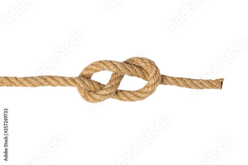 Rope isolated. Macro of figure eight node or knot from two brown ropes isolated on a white background. Navy and angler knot.
