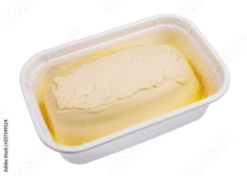 Creamy margarine in an industrial plastic container isolated