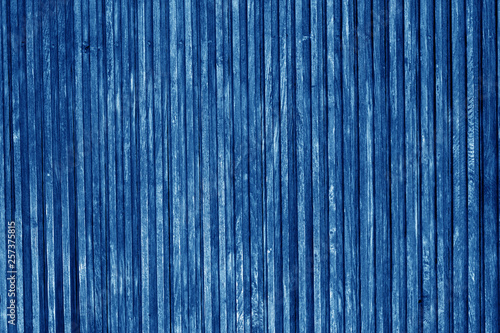 Decorative wooden surface in navy blue color.