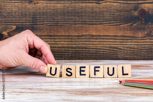 Useful. Wooden letters on the office desk, informative and communication background