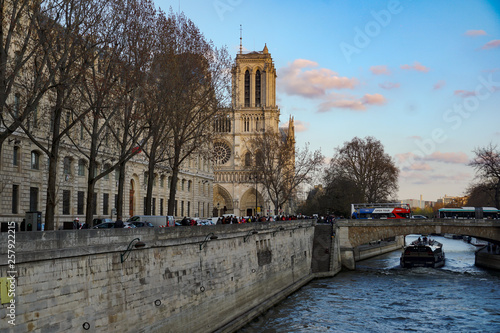 Panoramic view of Paris and Notre-Dame Cathedral. Notre-Dame de Paris is a medieval Catholic cathedral on the Ile de la Cité in the fourth arrondissement of Paris