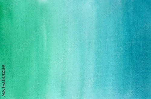 Horizontal gradient from blue to green watercolor background, wash technique. Bright aquamarine forest and water watercolour textured concept