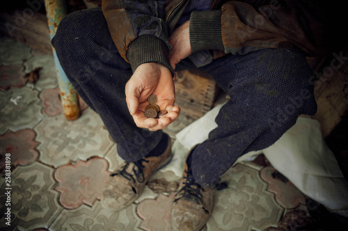 Male hand asks for money. The concept of poverty in the country.