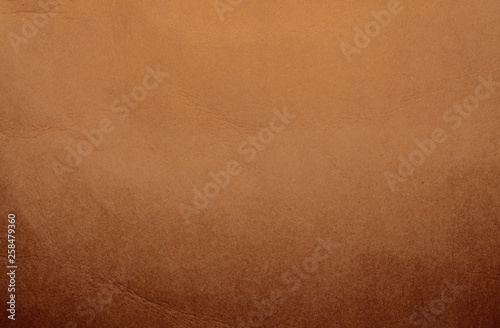 Brown cardboard texture, background, abstraction, gradient. Paper space for text.
